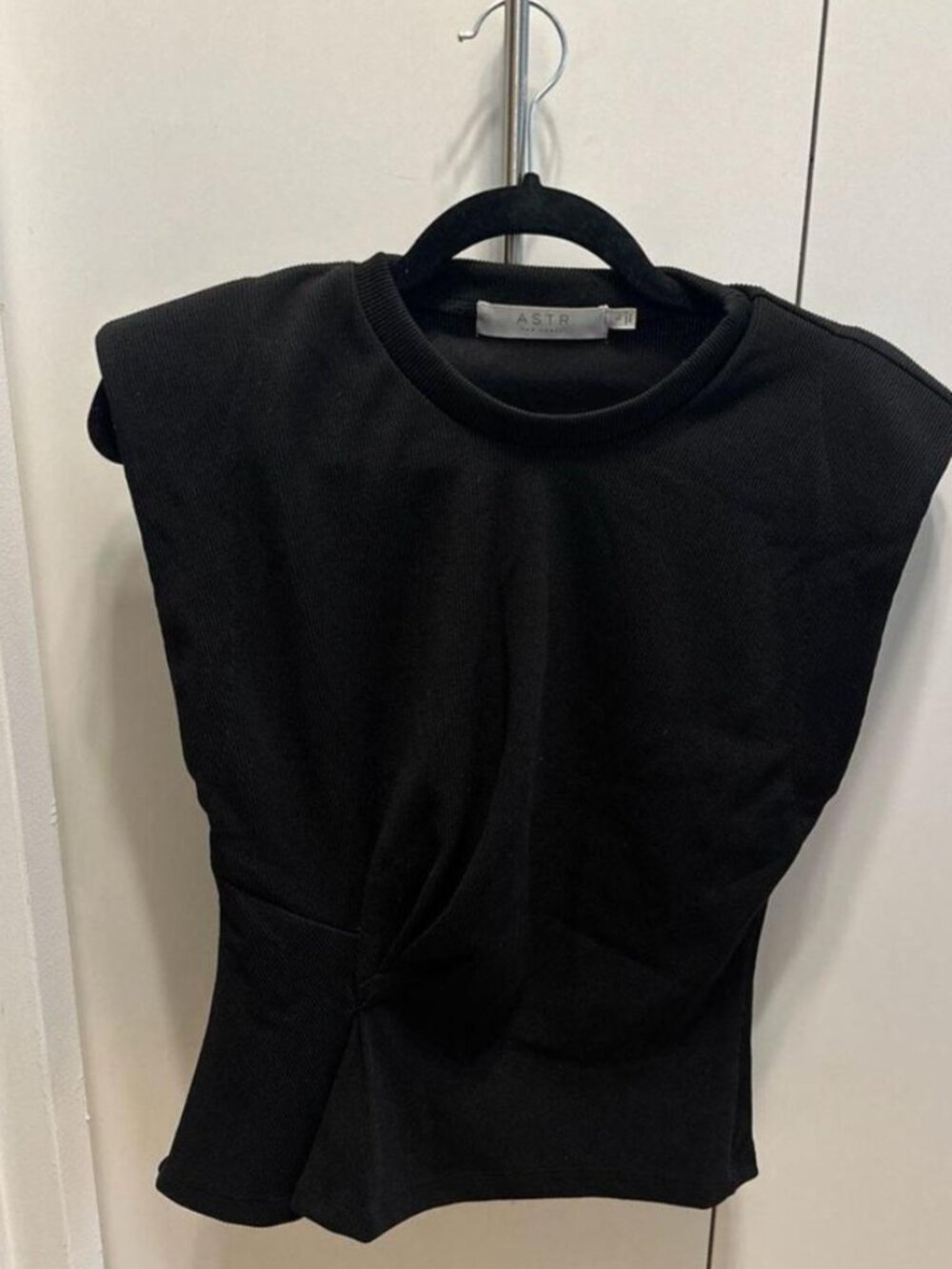 ASTR the Label Twisted Waist Shoulder Pad Knit Top